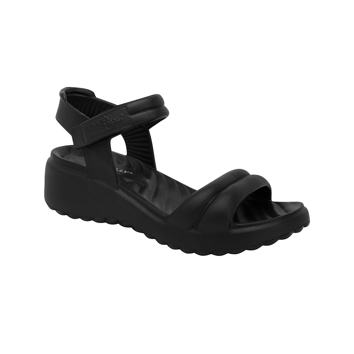 Sandalia negra cuña media cómoda y ligera para mujer. Ajuste con velcro al tobillo y suela antideslizante. Ideal para el uso diario. Colección Marshmallow
