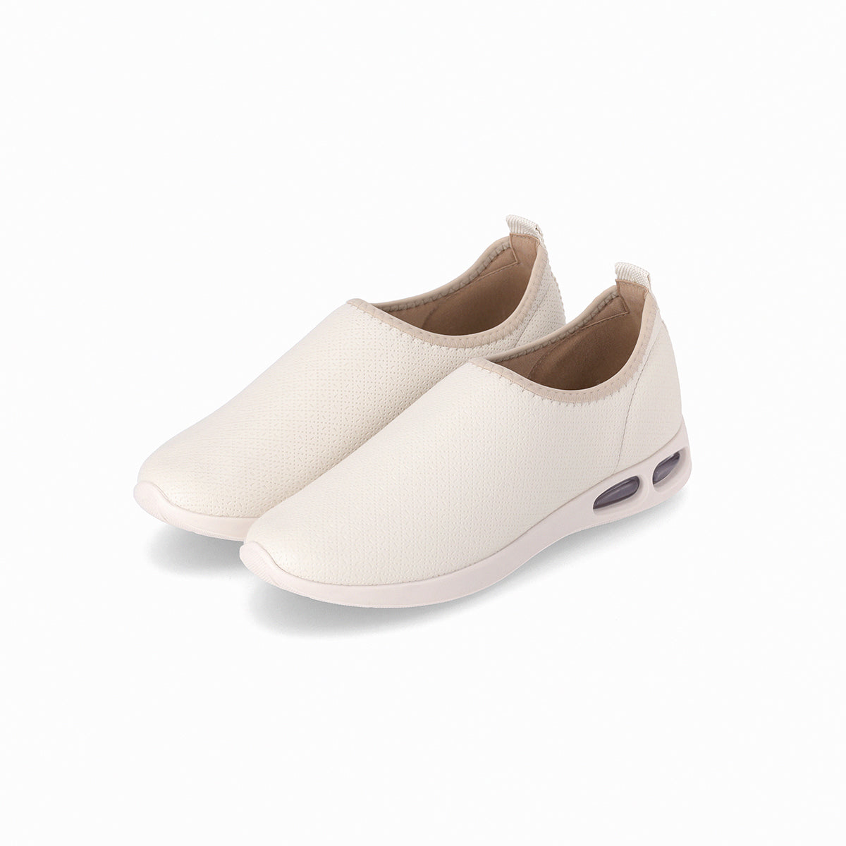 Tenis casuales color blanco cerrado sin agujetas con amortiguación Soft Step para mujer, suela de 2.5 cm. Estilo casual, versátiles y cómodos con absorción de impactos.