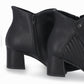 Botín para mujer tacón medio 5 cm con costuras laterales color negro cierre lateral elegantes