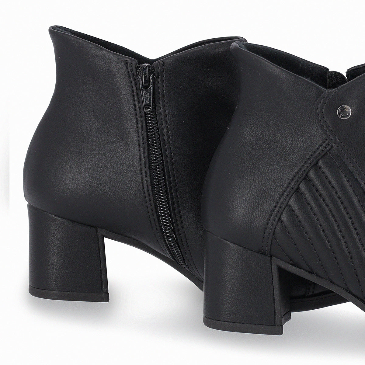 Botín para mujer tacón medio 5 cm con costuras laterales color negro cierre lateral elegantes