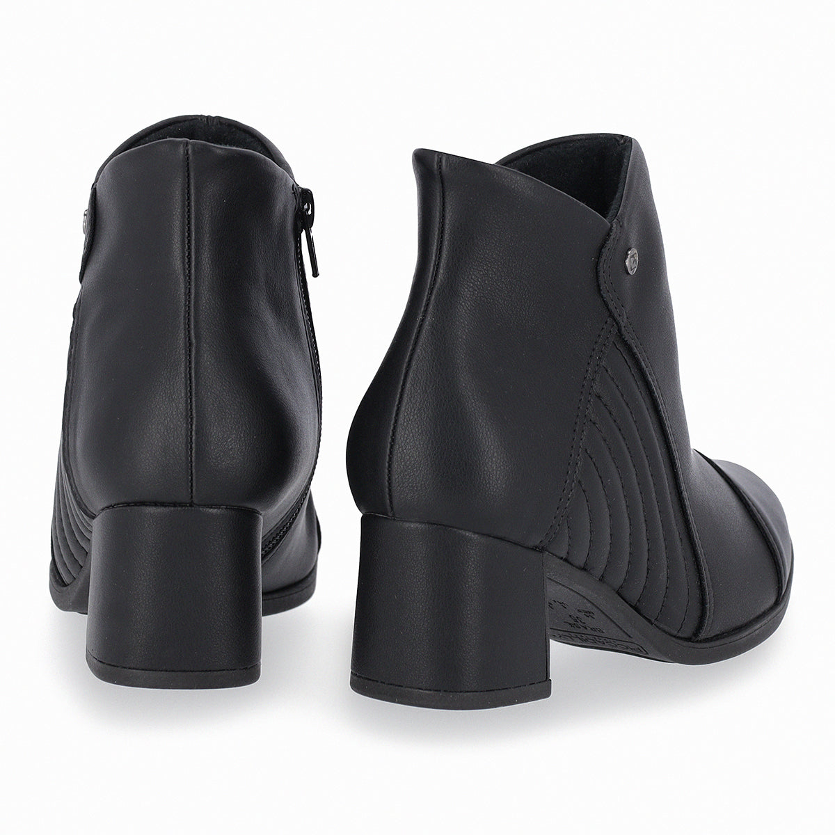 Botín para mujer tacón medio 5 cm con costuras laterales color negro cierre lateral vista trasera