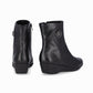 vista trasera botines negros para mujer con suela corrida tacón de 3 cm